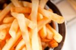 Fresh French Fries On A Bucket Stock Photo