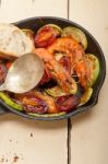 Roasted Shrimps With Zucchini And Tomatoes Stock Photo