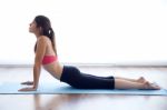 Beautiful Healthy Young Woman Doing Exercise At Home Stock Photo