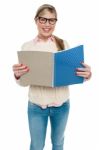 Smiling Student Reading From Her Note Book Stock Photo