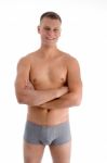 Muscular Man With Crossed Arms Stock Photo