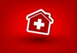 Symbol Of The House And First Aid Stock Photo