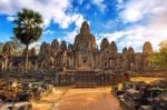 Ancient Stone Faces At Sunset Of Bayon Temple, Angkor Wat, Siam Reap, Cambodia Stock Photo