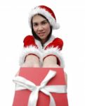 Santa Girl Giving Present Stock Photo