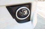 Closeup Headlights Of Modern White Car Stock Photo