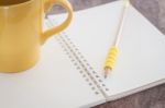 Open Blank Notebook With Pencil Stock Photo