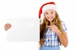 Santa Woman Pointing At Board Stock Photo