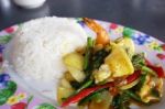 Seafood With Yellow Curry Sauce With Rice , Sauteed Seafood Contains Shrimp Squid, Stock Photo