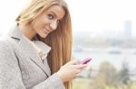 Lady With Pink Cell Phone Stock Photo