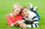 Smiling Young Couple In Outdoor Stock Photo