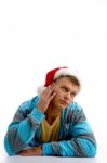 Thinking Man Wearing Christmas Hat Stock Photo