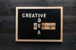 Slate With The Words Creative, Idea And Design Stock Photo