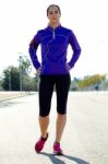 Young Woman Stretching And Preparing For Running Stock Photo