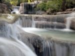 Waterfall With Water Flowing Around Stock Photo