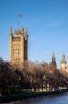 View Along The River Thames To The Houses Of Parliament Stock Photo