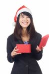 Young Lady Wearing Santa Hat Stock Photo