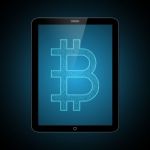 Bitcoin With Tablet Computer Stock Photo