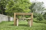 Wooden Bench In Outdoors Garden In Summer Stock Photo