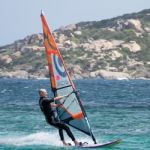 Windsurfing At Porto Pollo In Sardinia Stock Photo