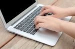 Closeup Of Business Woman Hand Typing On Laptop Keyboard Stock Photo