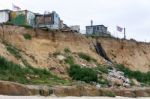 Happisburgh, Norfolk/uk - August 6 : Coastal Erosion At Happisbu Stock Photo