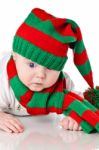 Baby With Christmas Hat And Scarf Stock Photo