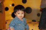 Thai Boy Having Fun In Aquarium Stock Photo