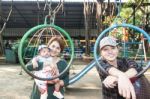 The Family In The Playground Stock Photo