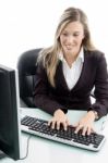 Blonde Woman Working On Computer Stock Photo