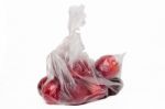 View Of Some Plums Inside A Plastic Bag Stock Photo