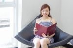 Portrait Of Thai Adult Businesswoman Beautiful Girl Read A Book Stock Photo