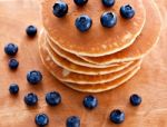 Stack Of Pancakes With Fresh Blueberries Stock Photo