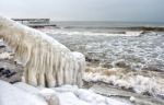 Ice Covered Staircase On The Beach Stock Photo