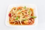 Thai Food Papaya Salad On White Dish Stock Photo