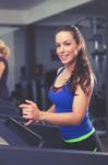 Woman Running On Treadmill Stock Photo