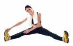 Lady Doing Stretching Exercise Stock Photo