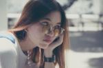 Portrait Of Thai Chinese Adult Glasses Beautiful Girl Denim Blue Bag Relax And Smile Stock Photo