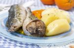 Mackerel Fish With Potato And Carrot Stock Photo