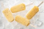 Passion Fruit  Popsicle Yummy Fresh Summer Fruit Sweet Dessert Wood Teak White Stock Photo