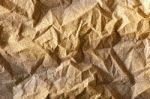 Gold Crumpled Glitter Shiny Paper Background Stock Photo