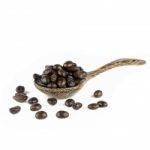 Coffee Beans In Olive Wood Spoon Stock Photo