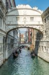 Gondoliers Ferrying People In Venice Stock Photo