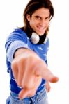 Front View Of Smiling Man Pointing Stock Photo