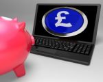 Pound Symbol Button On Laptop Shows Earnings Stock Photo