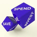 Save Spend Invest Dice Stock Photo