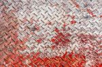 Red And White Diamond Pattern Metal Sheet Stock Photo