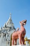 Red Lion Statue At Wat Phra That Hariphunchai Stock Photo