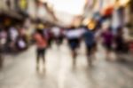 Blurred People Walking On The Street Stock Photo