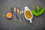 Fresh Passion Fruits Set Up On Dark Stone Background. Passion Fr Stock Photo