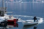 Boat Coming In At  Mandello Del Lario Stock Photo